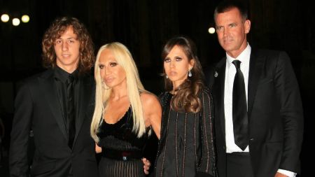 Photo of Versace with  her husband and 2 children